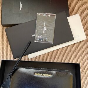 Saint Laurent Black Leather Clutch with Gold Accents